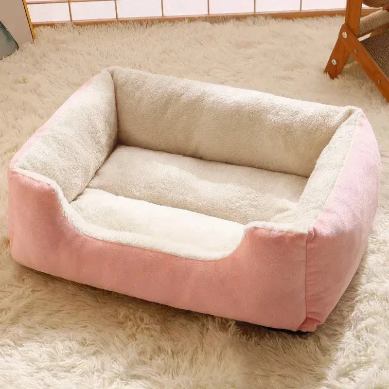 Soft short plush cat bed in grey, shown in a medium size for scale with a cat.