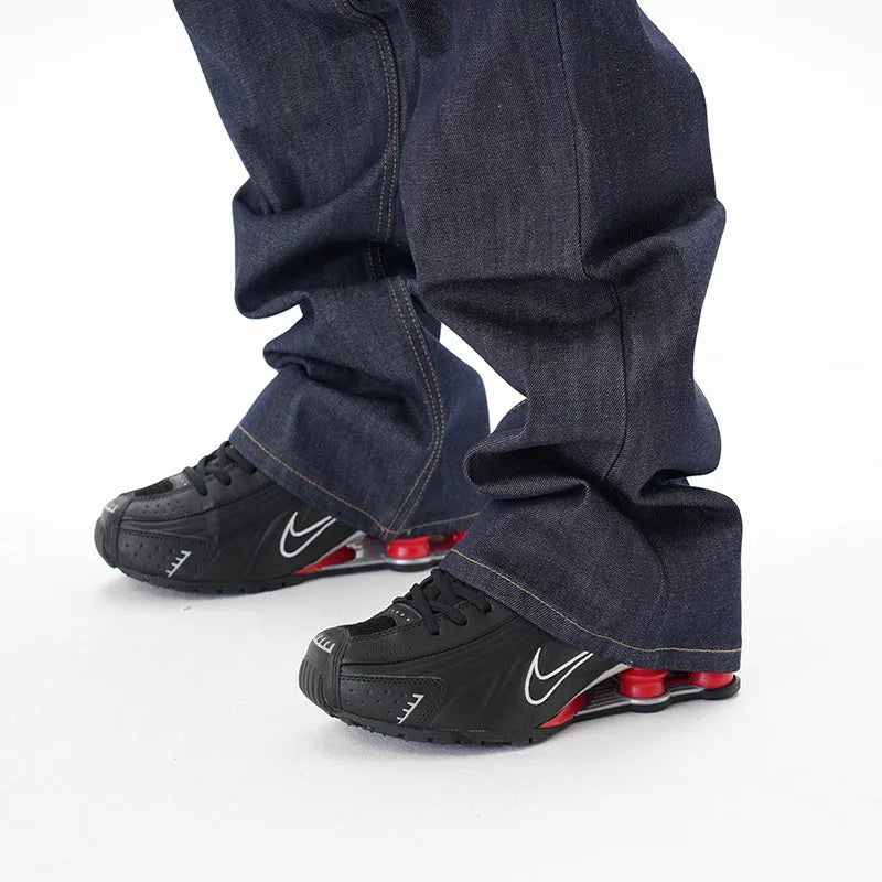 Men's dark blue loose straight leg jeans with original cattle wash on denim fabric