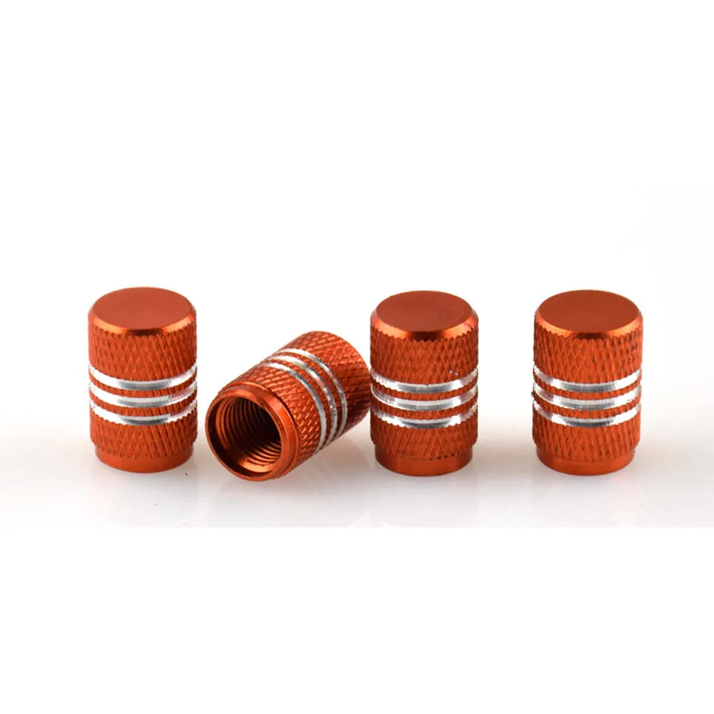 Set of aluminium alloy colour car tyre valve caps in various colours including red, blue, silver, and gold