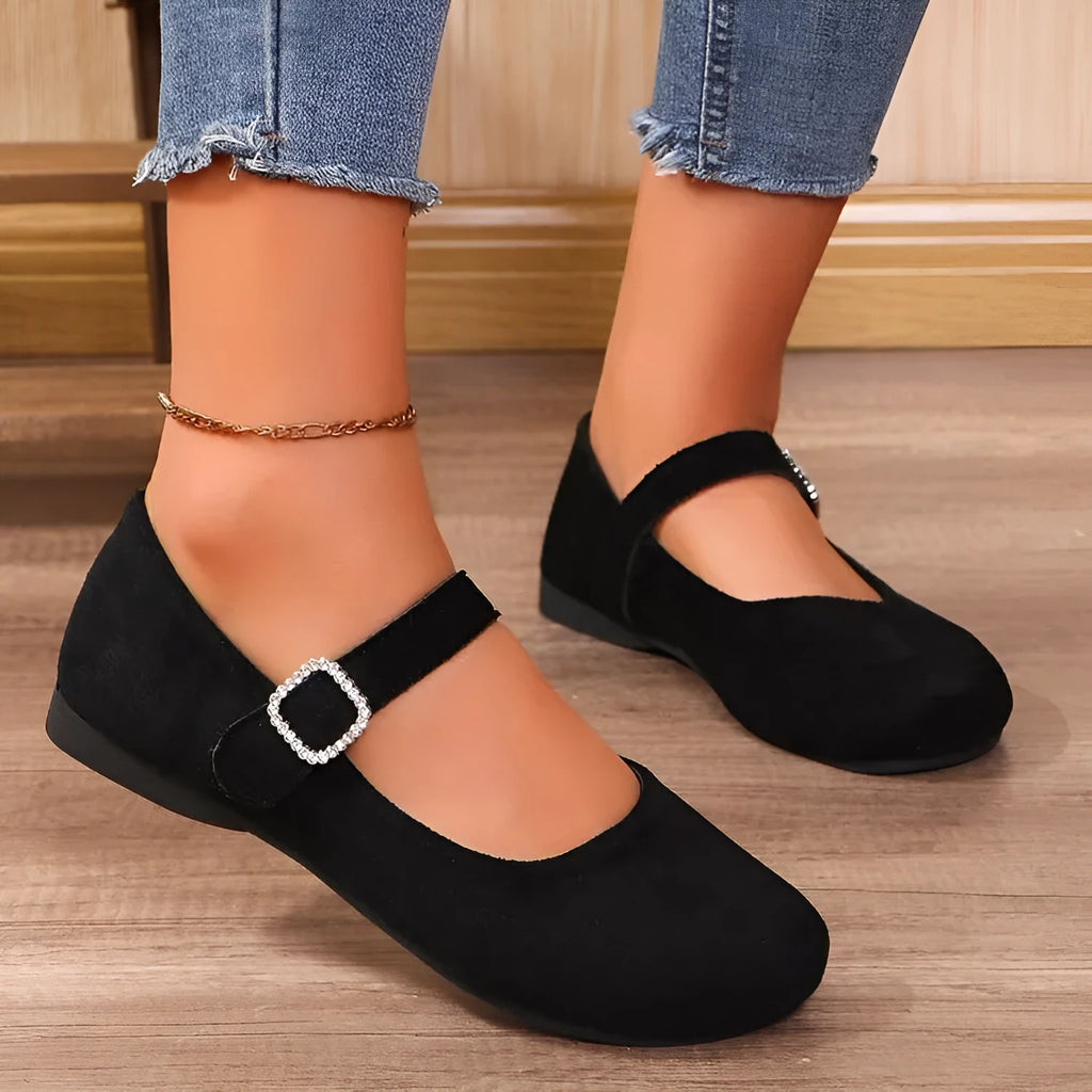 Black canvas women's flat fisherman shoes with low-top design and rubber soles