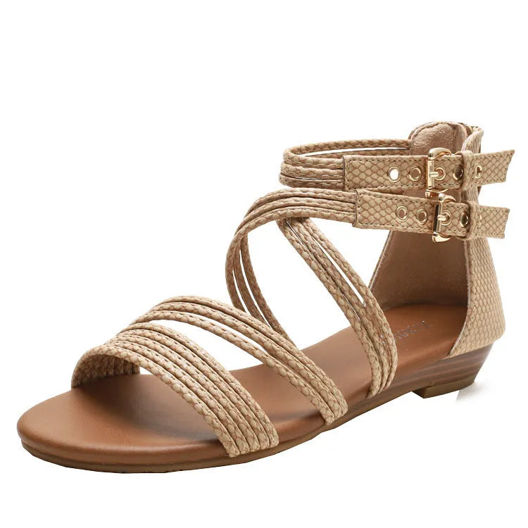 Women's open toe Roman sandals with cross straps, thick rubber sole, and back zipper in apricot colour
