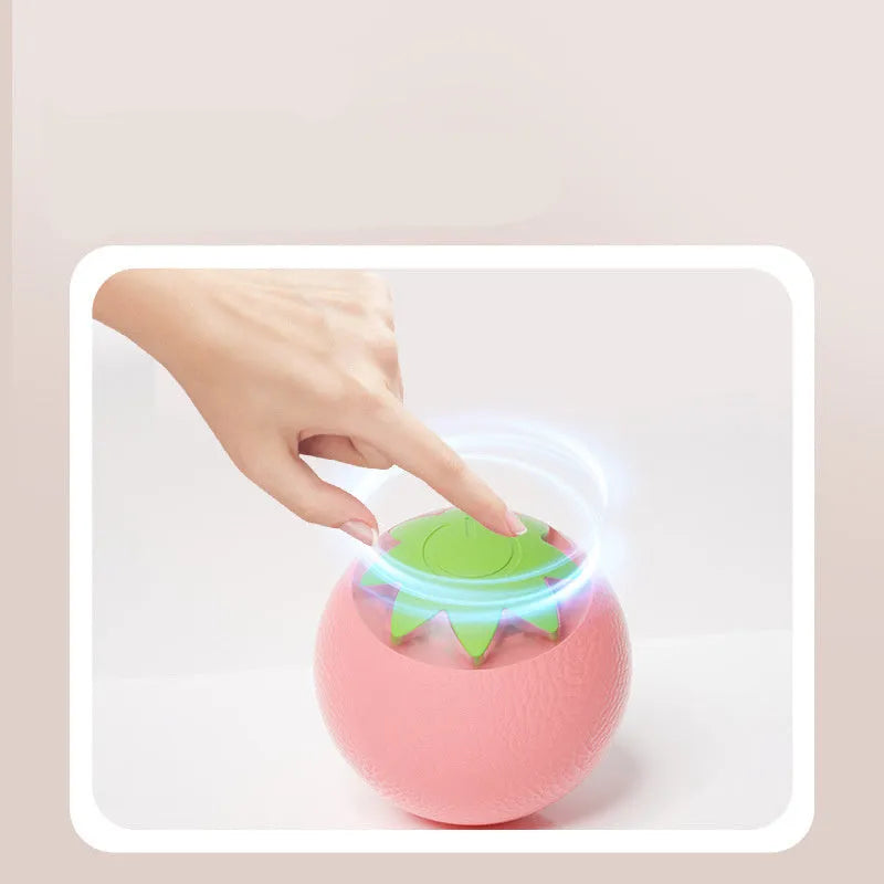 Small green automatic rolling ball pet toy for indoor dog and cat entertainment