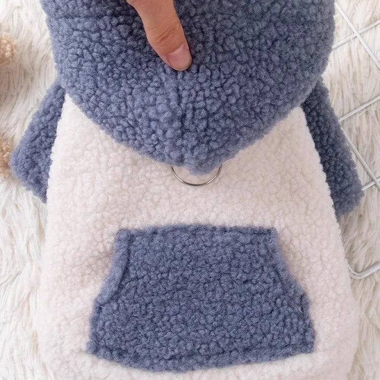 A blue hooded dog coat with thick cotton padding, shown on a model.