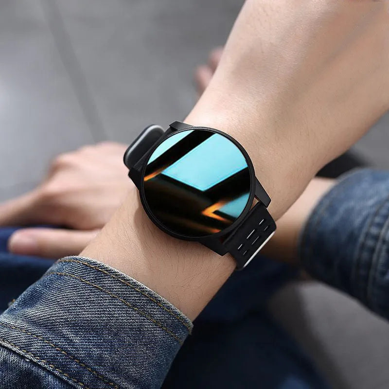 Black and grey smart watch with rubber strap showing fitness tracking data on its screen.