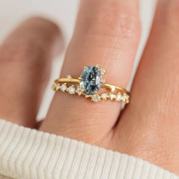 Gold plated women's ring with green zircon stones in flower design, available sizes 6-10