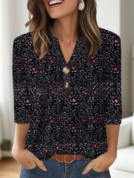 Women's loose fit casual top with a 3D printed pattern and a V-neck.