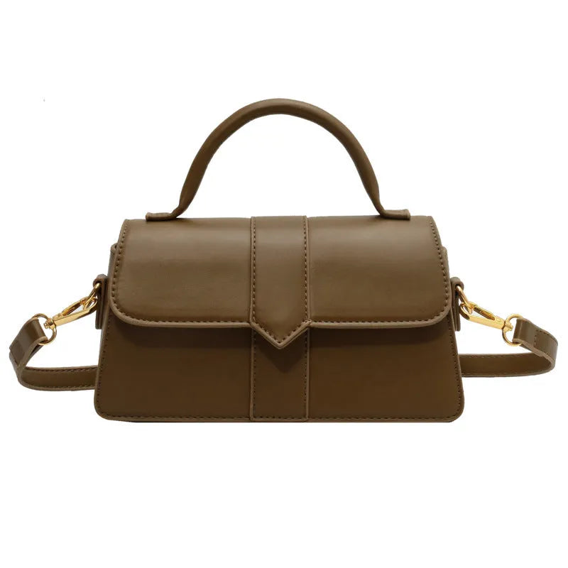 Beige women's square messenger bag with a top handle and shoulder strap, showing an outer pocket.