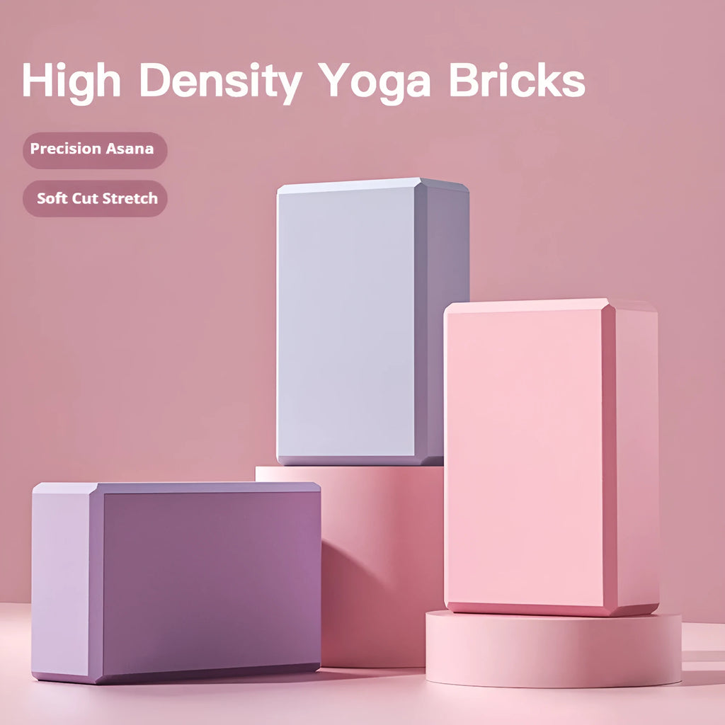 Solid colour high-density EVA yoga block on a gym floor.