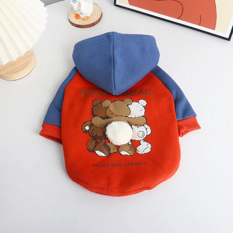 Red cotton dog coat for small and medium sized breeds like Teddy and Bichon on a mannequin