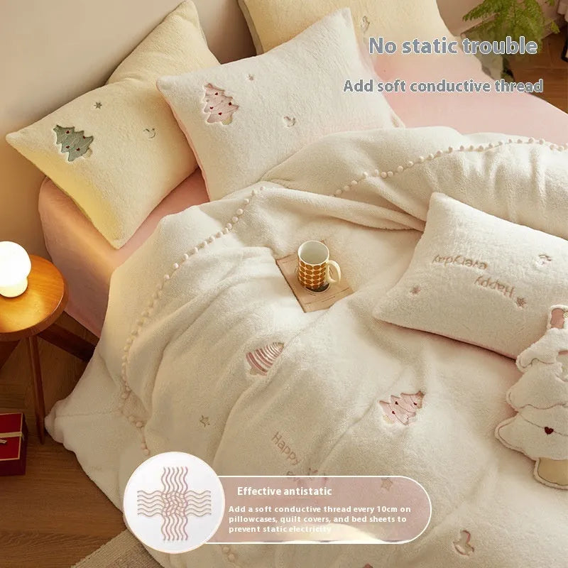 Milk fibre bedding four-piece set with green Christmas tree pattern on a bed.