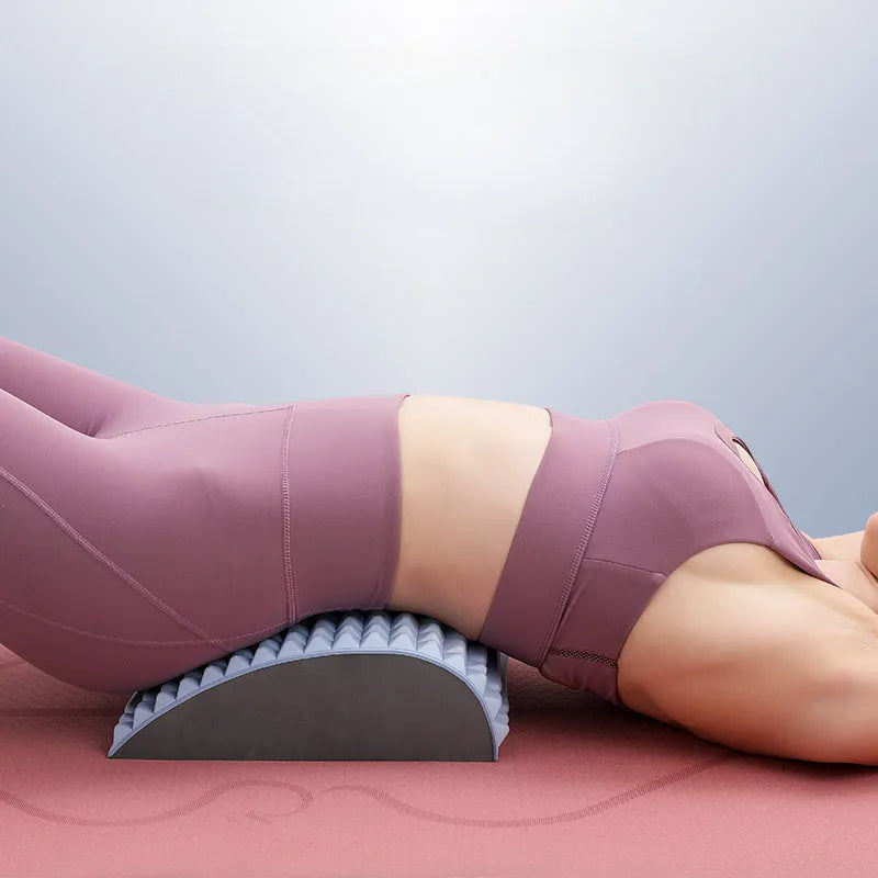 Blue EVA foam back stretcher pillow for lumbar and neck support on a flat surface.