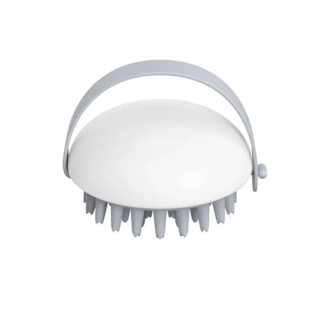 Blue silicone pet bathing brush with soft bristles and ergonomic handle for cats and dogs.