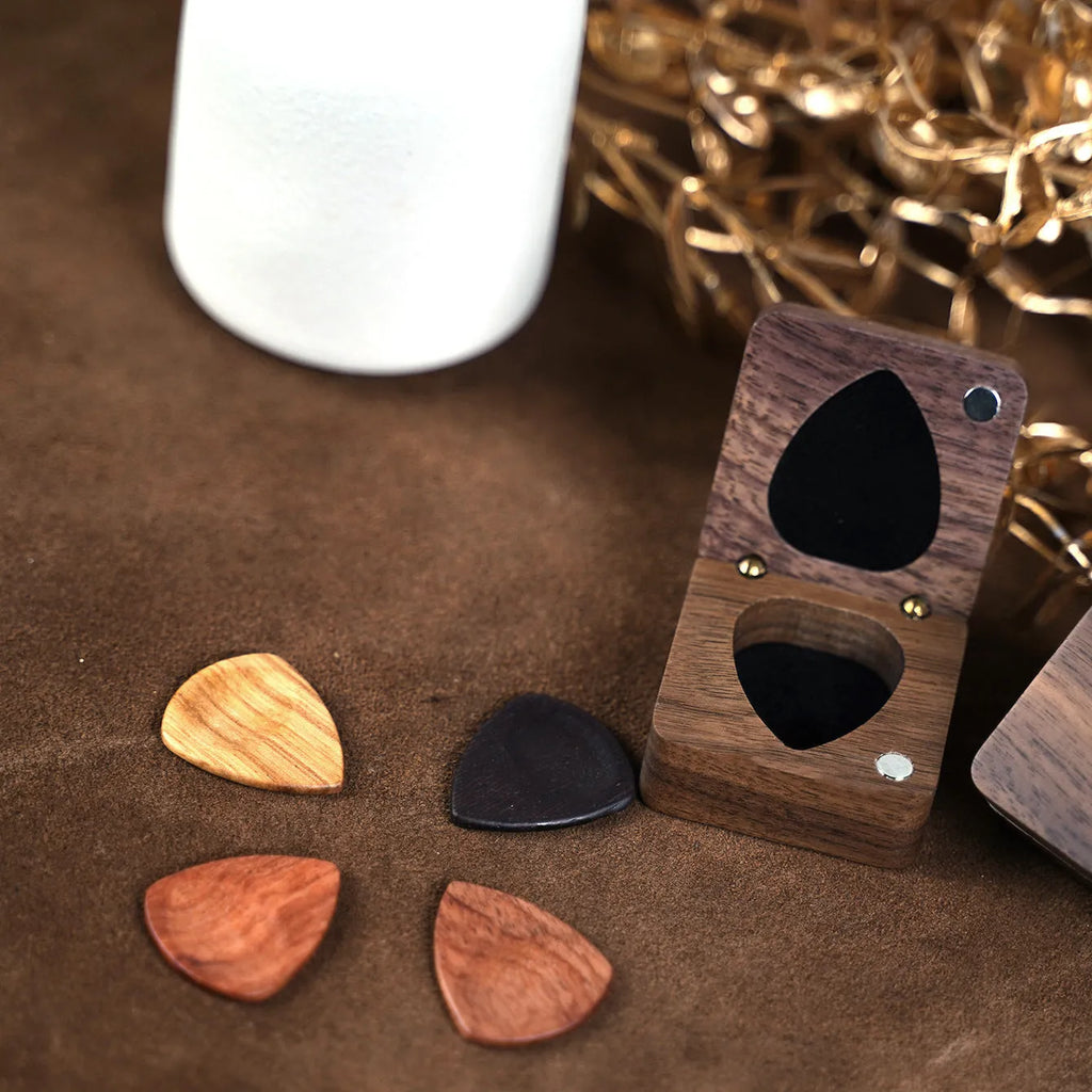Wooden guitar pick box storage container made from Sapele wood with a brown finish