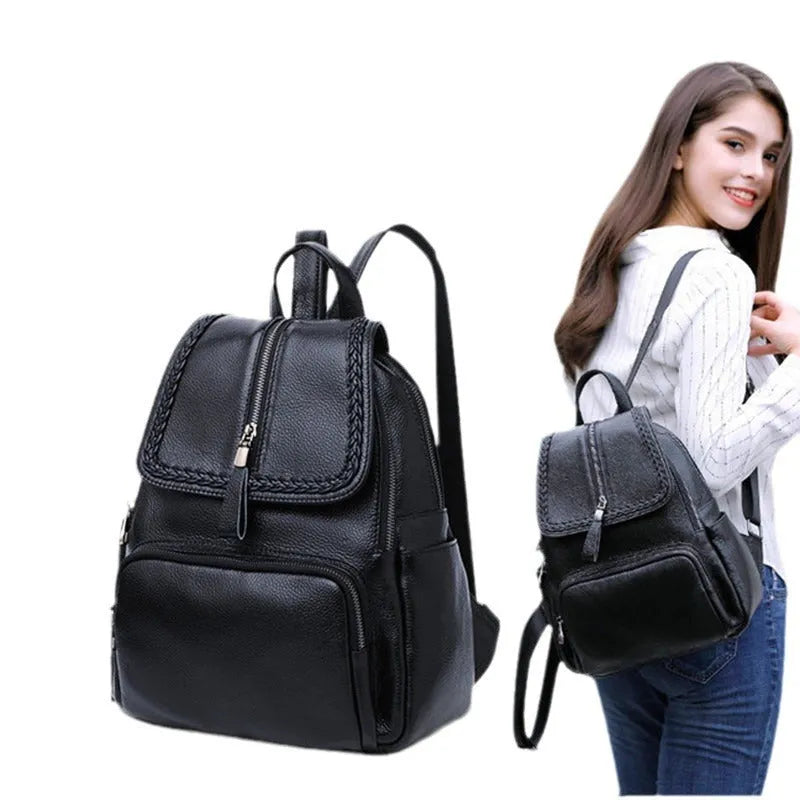 Solid colour genuine leather women's backpack showing blue and wine red options with internal compartments.
