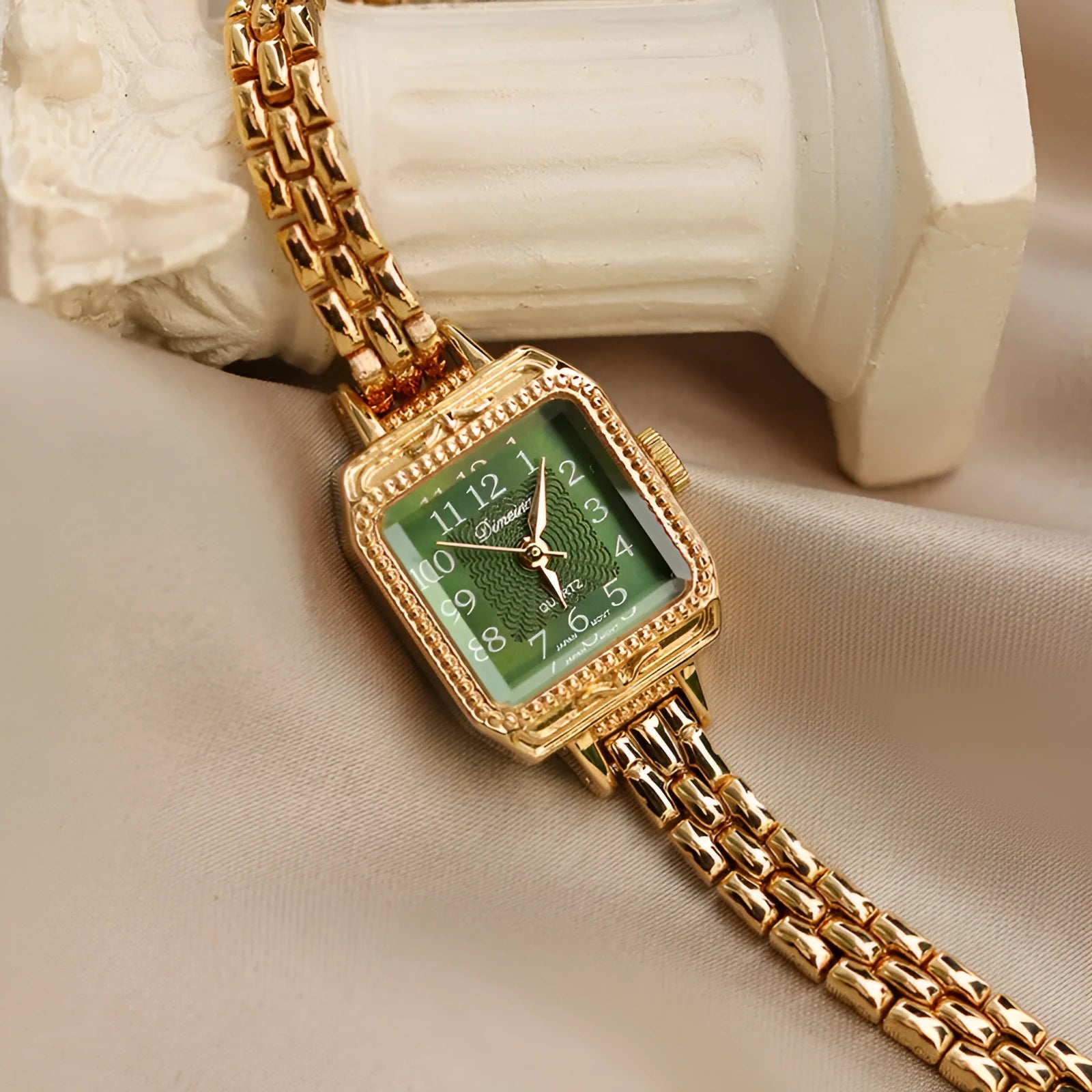 Women's square copper strip watch with green dial and gold strap, 7mm thick, Chinese style