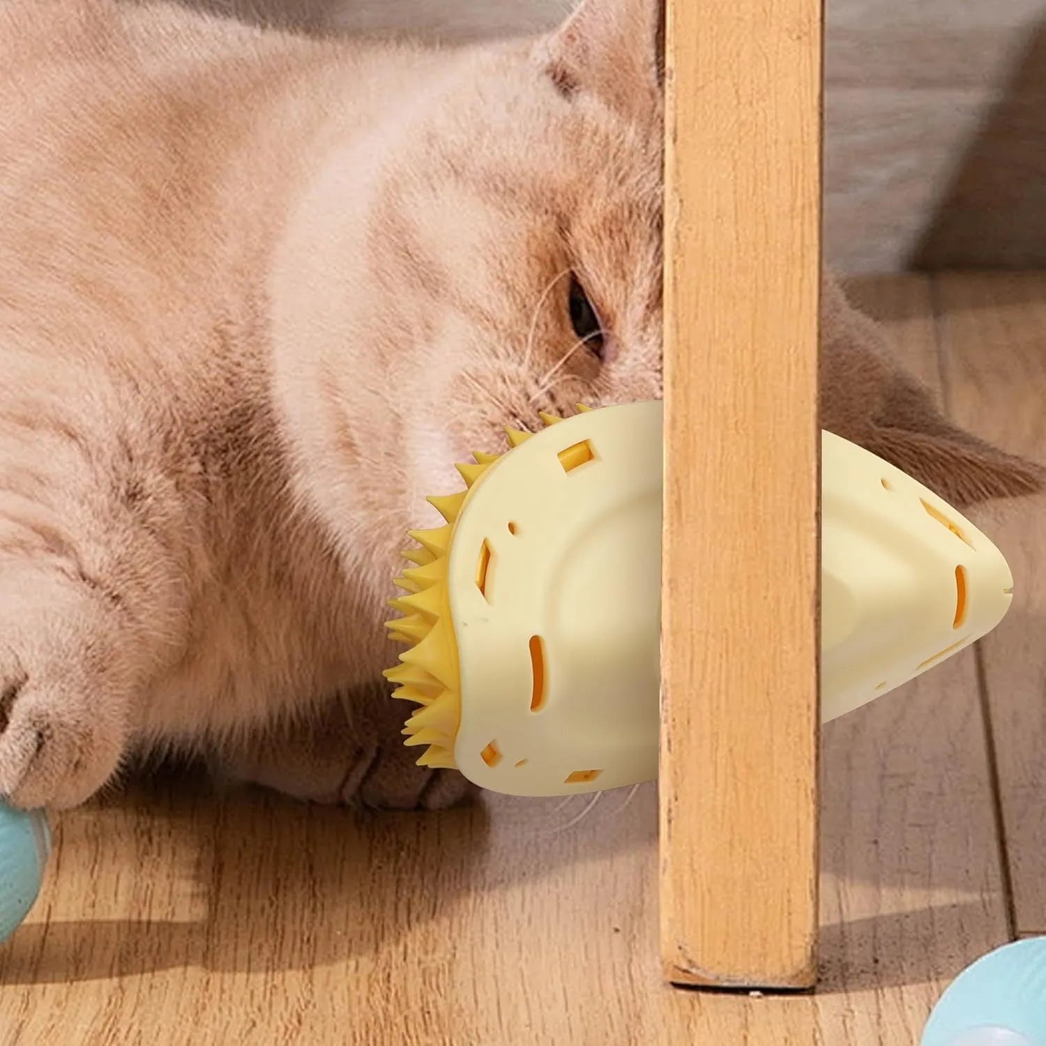 Yellow durian-shaped cat corner scratcher with comb surface mounted on wall corner