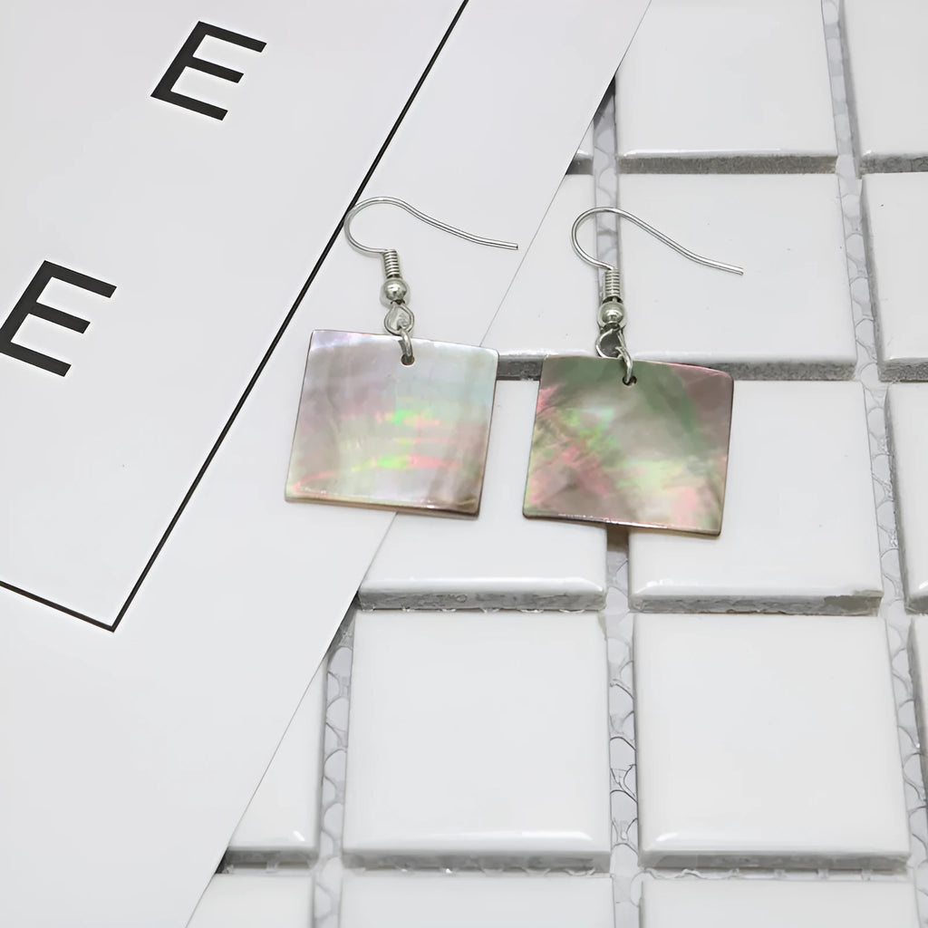 Geometric shell earrings with rectangular or square panther patterns, natural material, retro design
