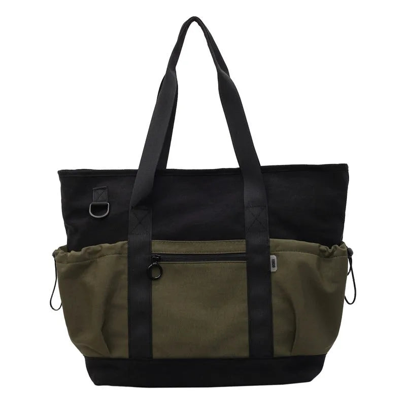 Lightweight Oxford cloth travel bag for women in grey, shown with a letter-pattern lining and holding a yoga mat.