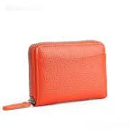Genuine leather zip coin purse in a choice of solid colours on a plain background.