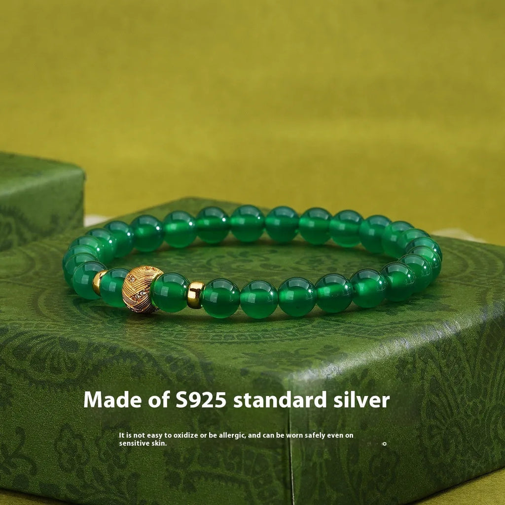 Green agate and S925 sterling silver bracelet with yellow gold accents and a 6mm round stone.