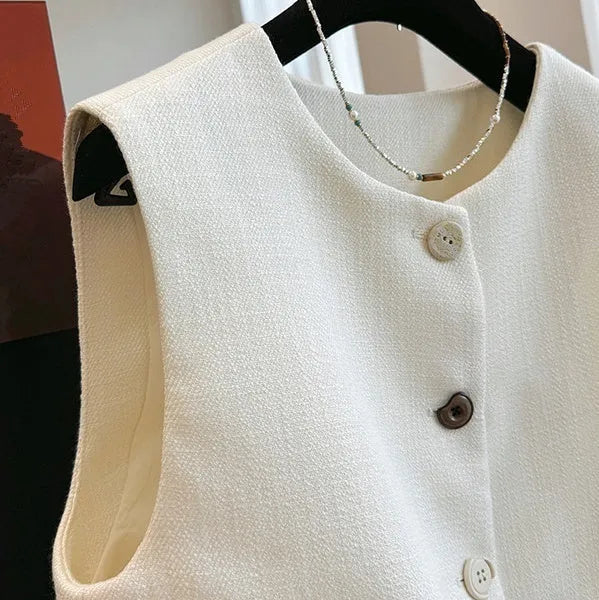 Women's milky white sleeveless bandage vest with round neck, French style design