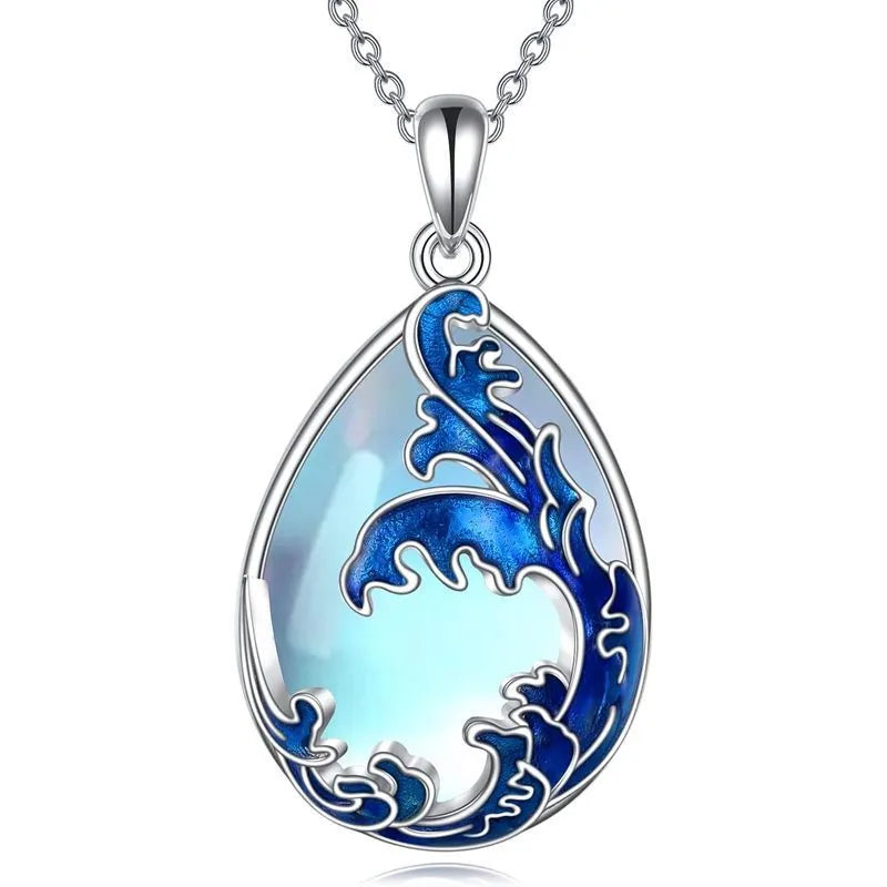 Moonstone blue heart-shaped alloy pendant necklace on a silver-plated chain for women.