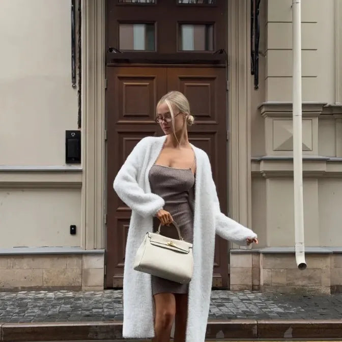 White long knitted cardigan jacket with loose fit and extended length