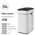 Stainless steel inductive smart trash can with square design on a kitchen floor.