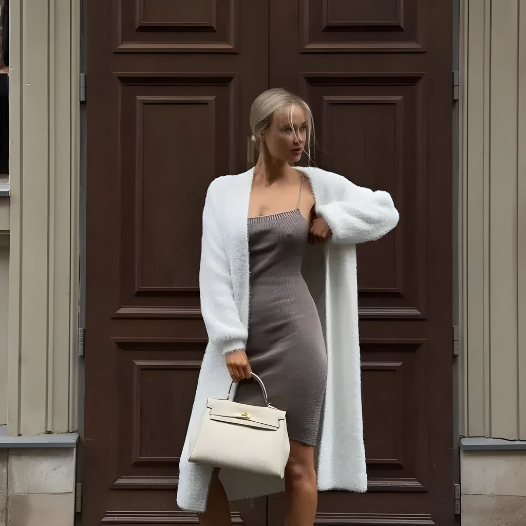 White long knitted cardigan jacket with loose fit and extended length