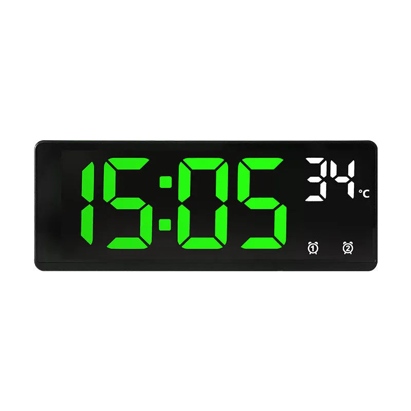 Electronic alarm clock with large LED screen showing time and temperature, in acrylic casing.
