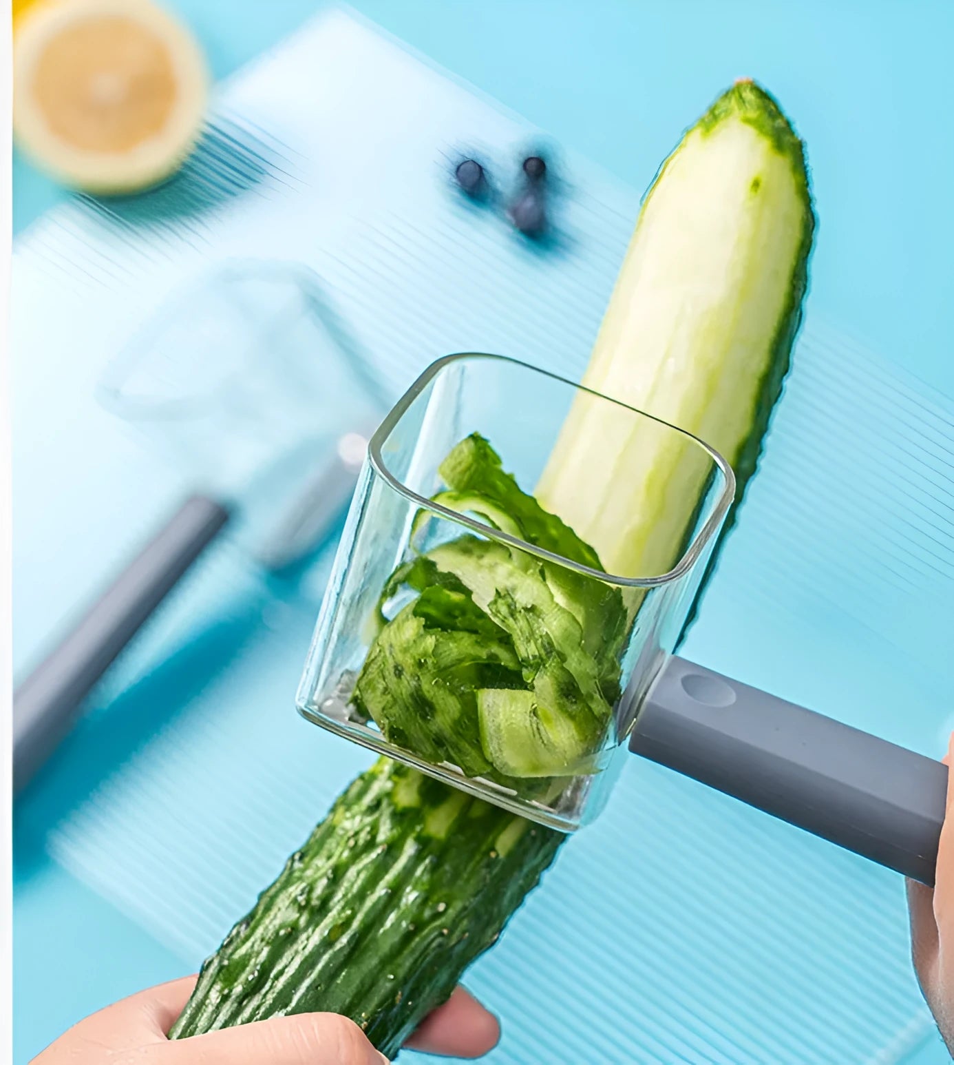 Stainless steel kitchen peeler with creative design in green, grey, and red colour options