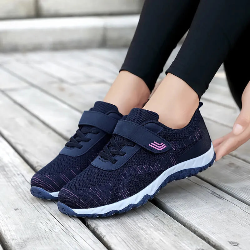 Women's low top wedge heel shoes with mesh upper and Velcro fastening in purple colour