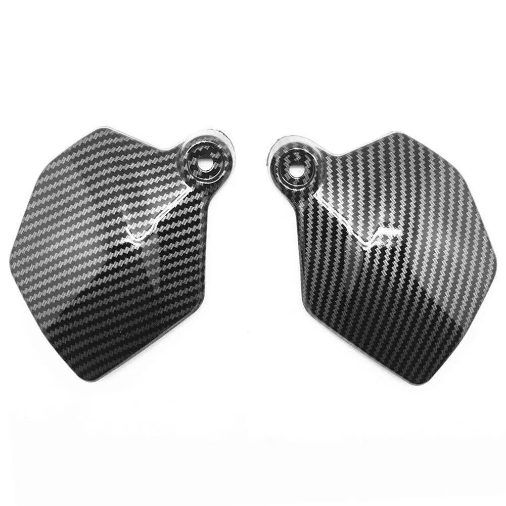Pair of black carbon fibre patterned motorcycle fairing frame covers for Honda CBR1000RR.