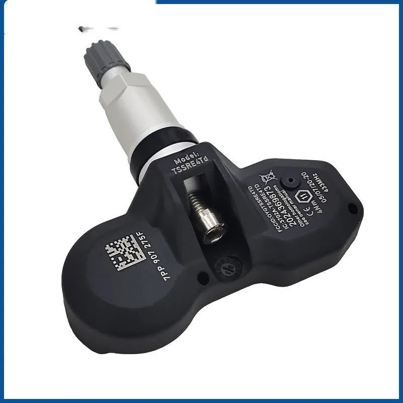 Black tyre pressure monitoring unit for Audi vehicles showing electronic components
