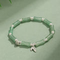 Green aventurine bamboo strawberry crystal bracelet with electroplated finish on adjustable elastic cord
