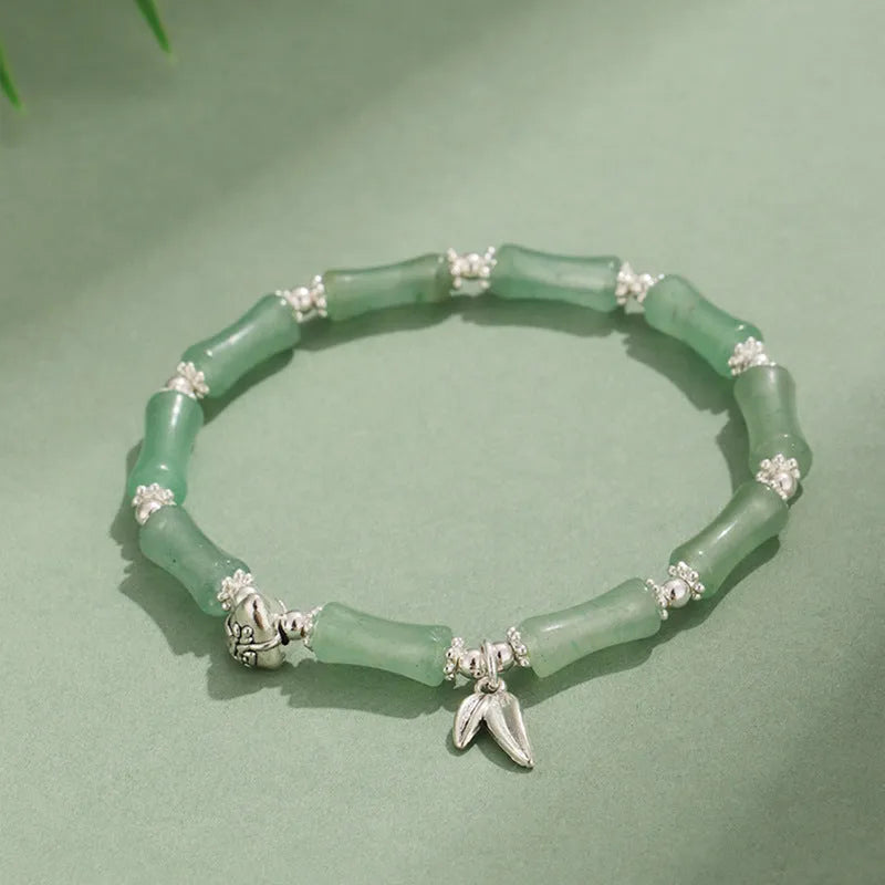 Green aventurine bamboo strawberry crystal bracelet with electroplated finish on adjustable elastic cord