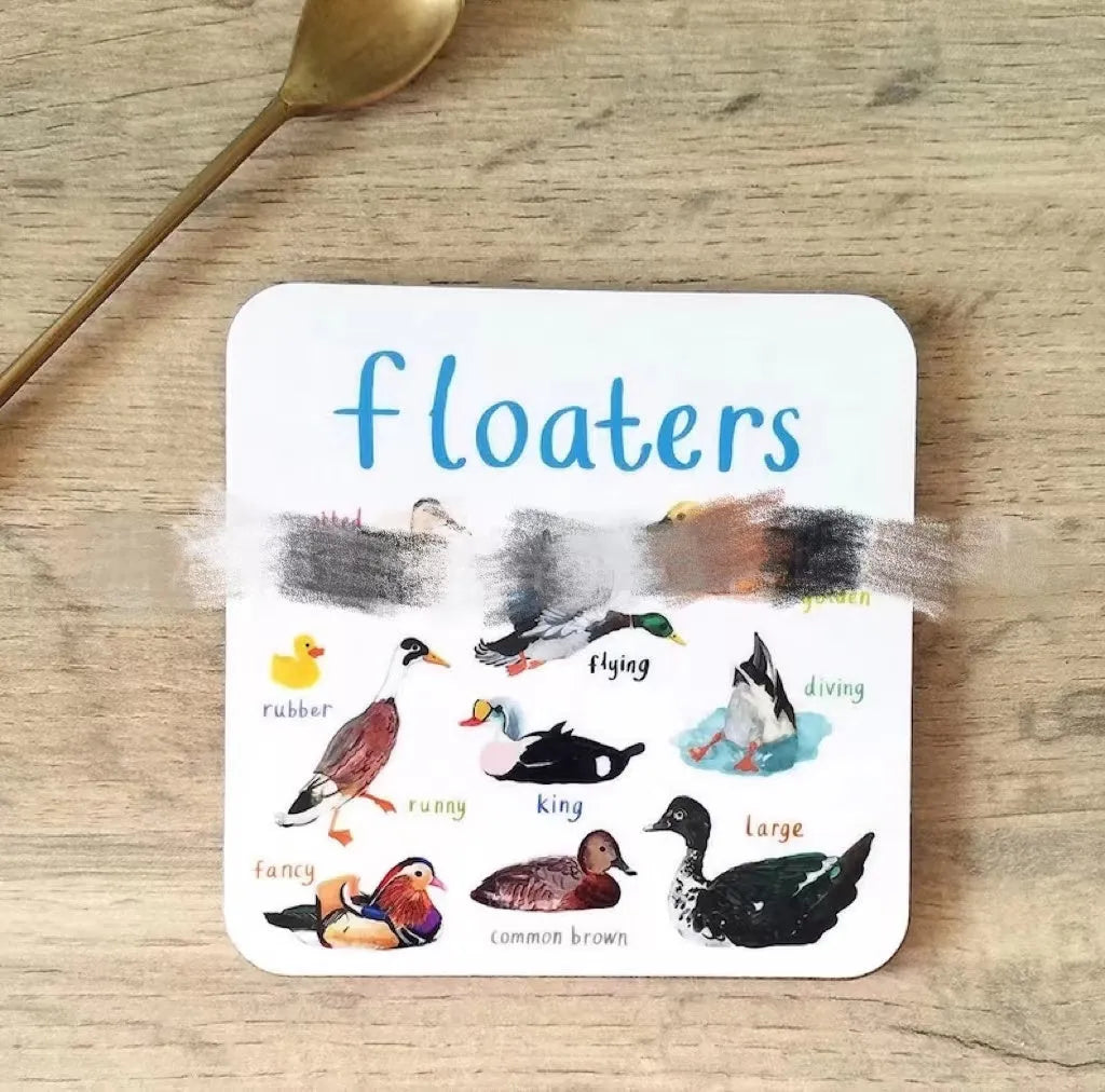 Set of six square PVC bird pun coasters with different bird chart designs on a table