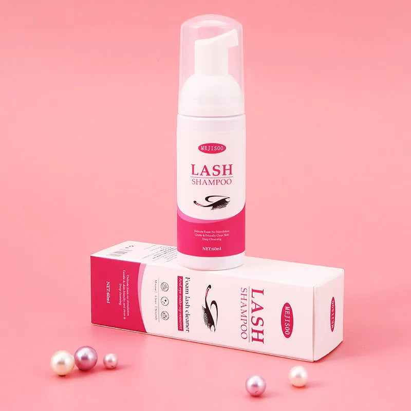 60ml bottle of eyelash cleaning mousse with pump, dimensions 3.7cm by 13.5cm.