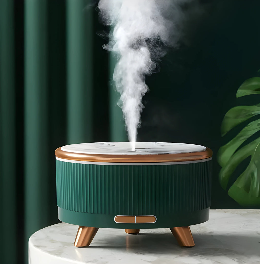 Cylinder plastic USB humidifier in black with 500ml tank and single fog outlet on a bedside table