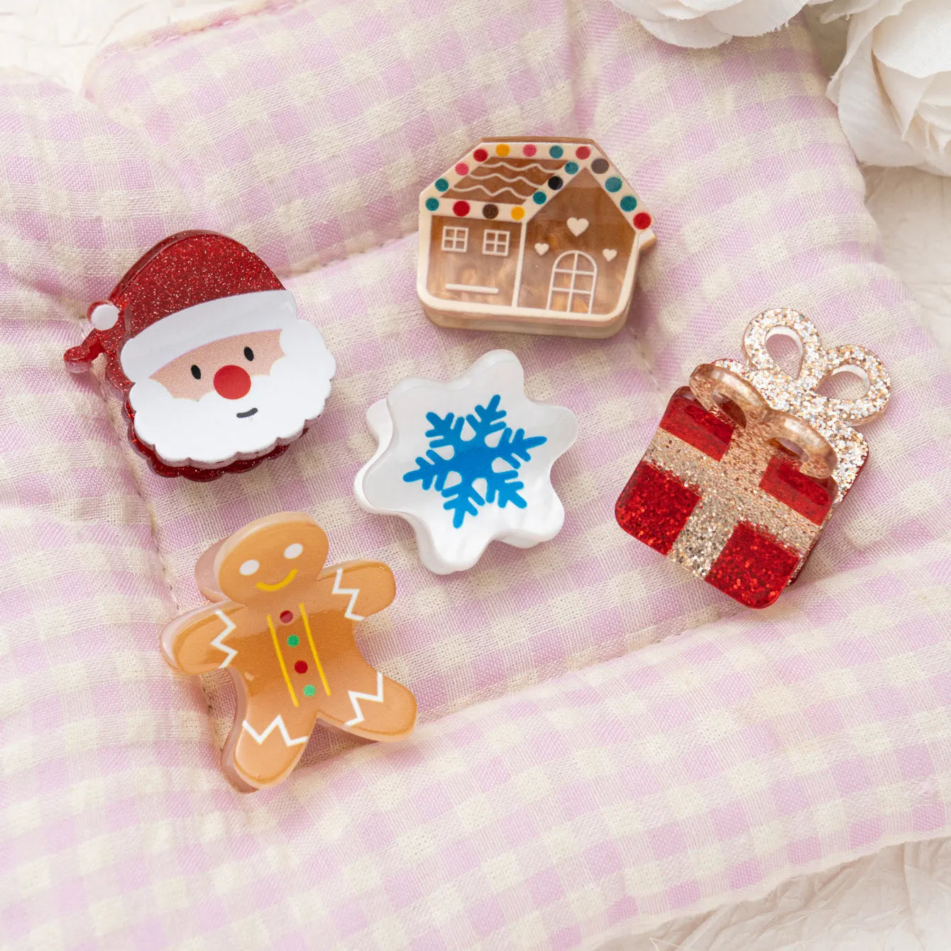 Oil-finished acrylic Christmas series small jaw clip barrette with snowflake design on white background