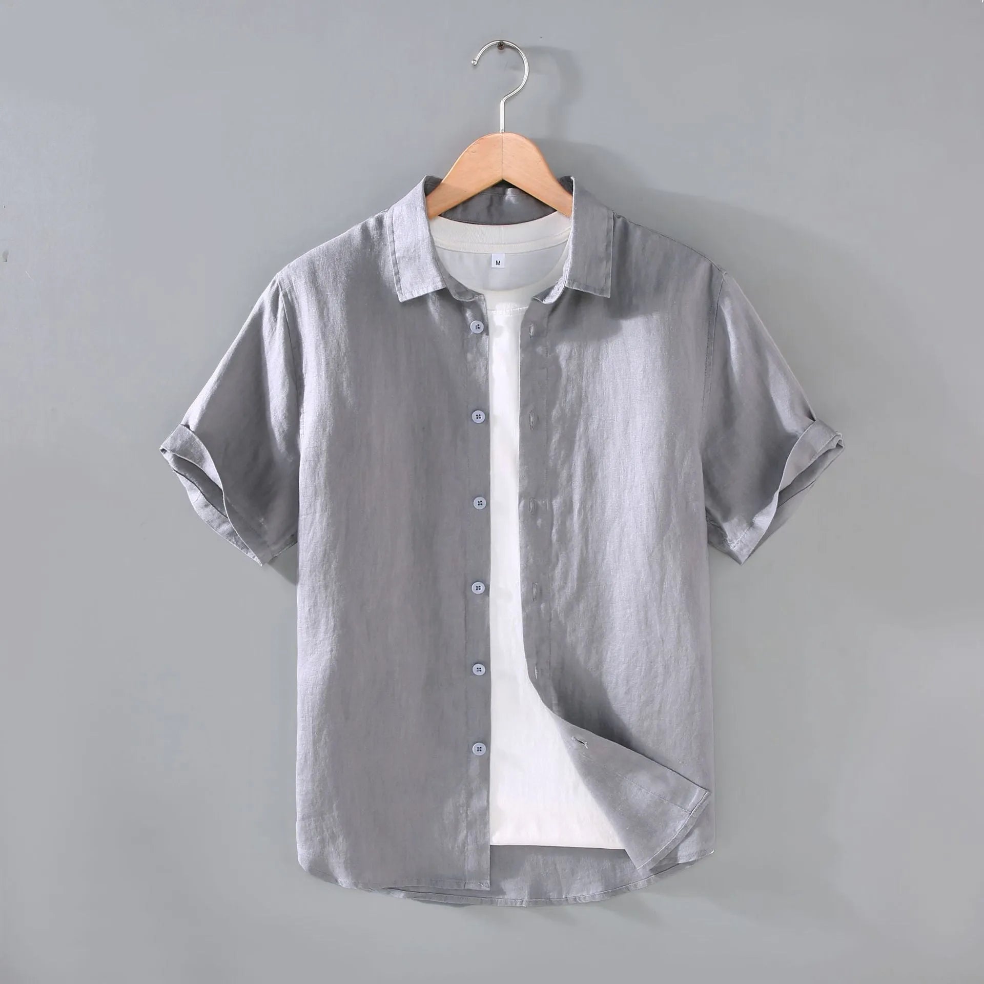 Men's linen short-sleeved cardigan shirt in regular fit showing colour options and thin fabric texture