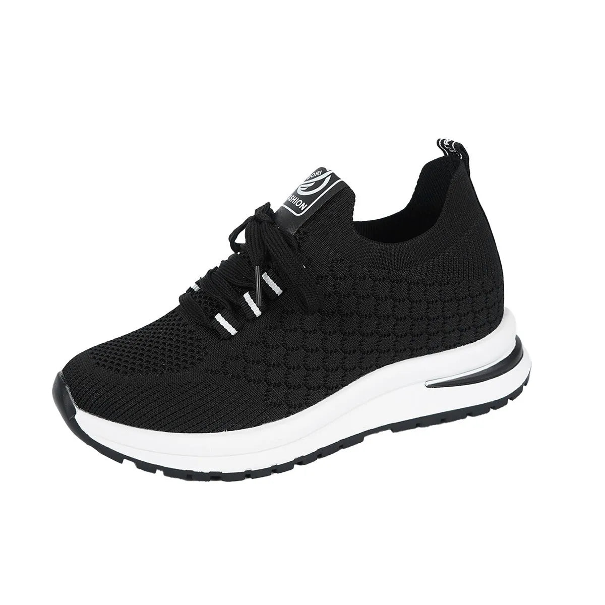 Black and white women's flat lace-up mesh sneakers with round toe on a rubber sole.