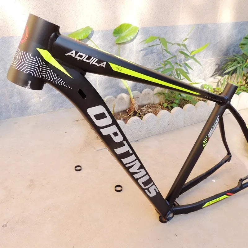 Black Green 29-inch aluminium alloy mountain bike frame showing disc brake mount and internal routing ports.