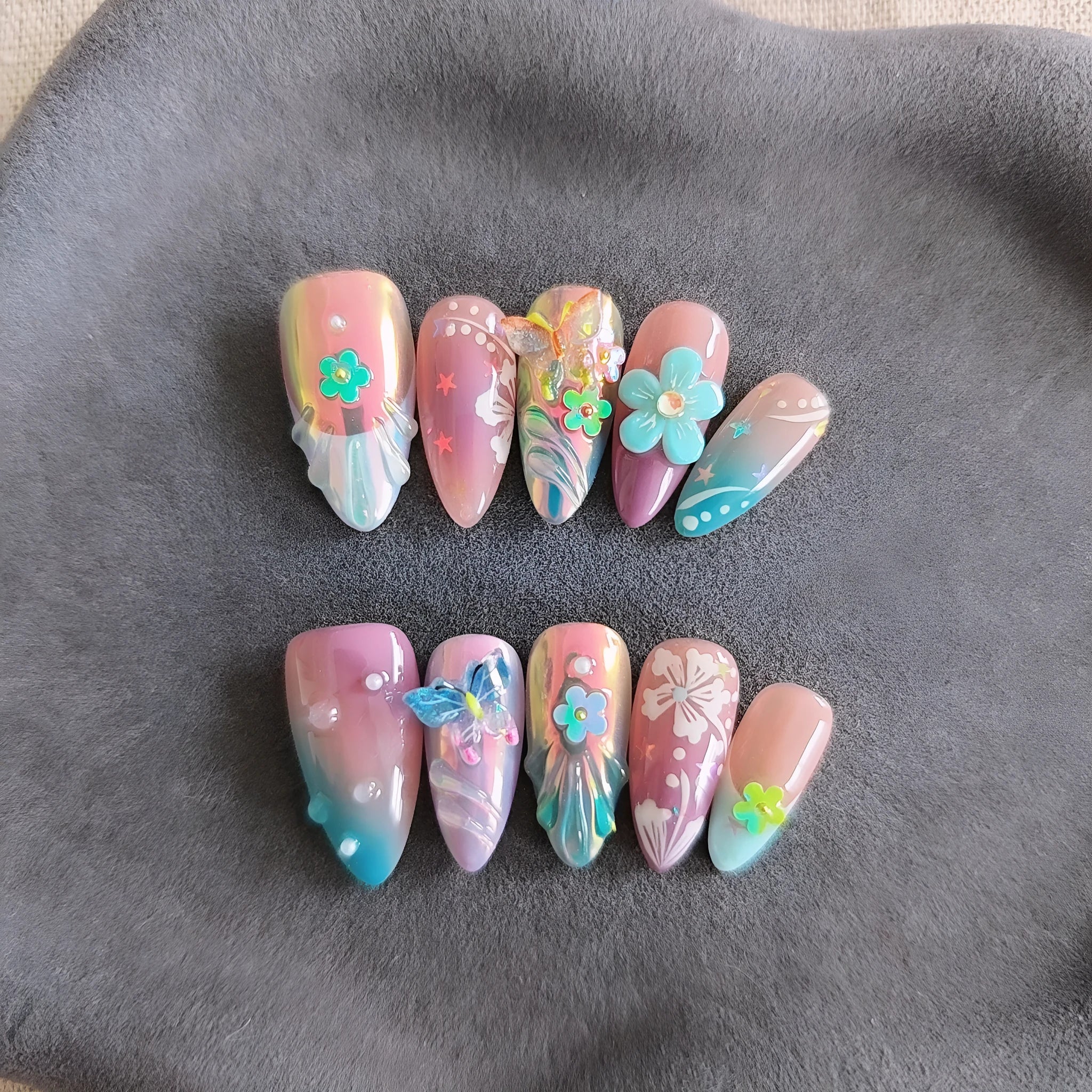 Handmade colourful embossed floral and butterfly nail art sculptures in sizes XS, S, M, L.