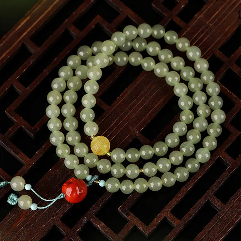 Pale blue Hetian jade bracelet with 6mm beads in three-circle traditional design