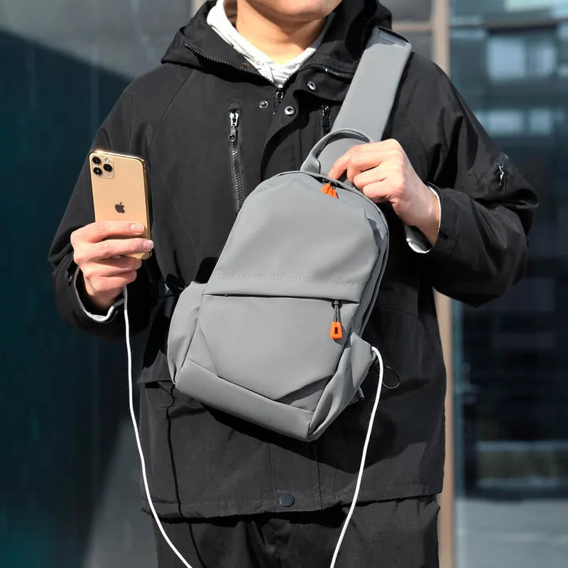 Men's black casual crossbody bag made from waterproof polyester with single shoulder strap