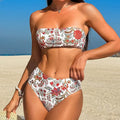 Women's printed bandeau swimsuit top with matching shorts for swimming.