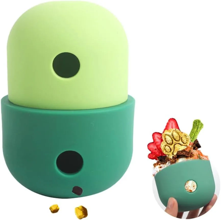 Food grade silicone dog treat dispensing puzzle ball in four colour combinations measuring 8×11cm