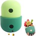 Food grade silicone dog treat dispensing puzzle ball in four colour combinations measuring 8×11cm