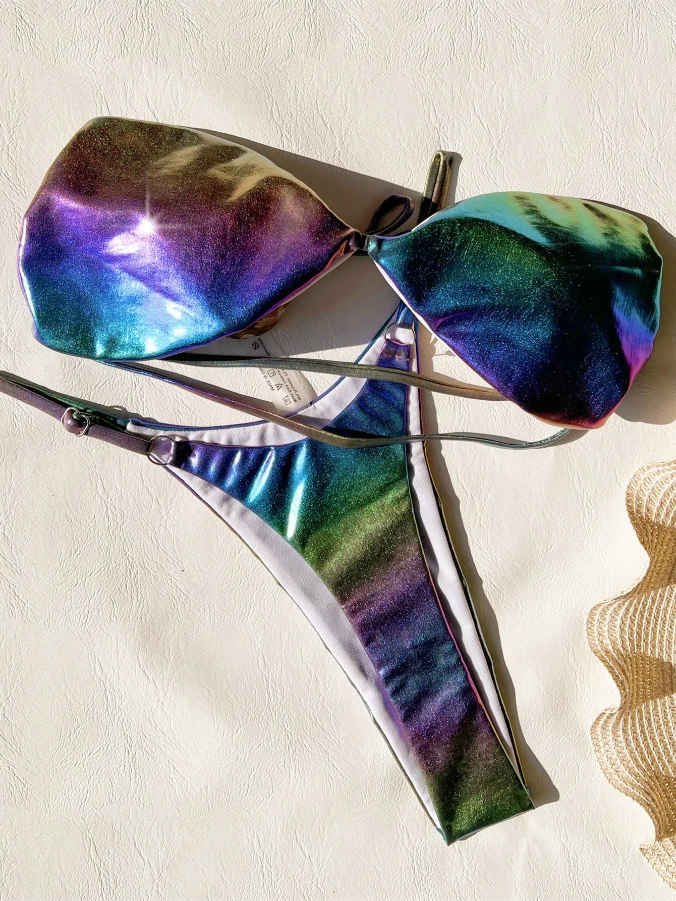 Women's gradient purple bikini swimsuit set on a white background